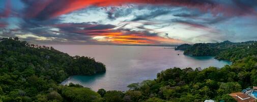 Aerial photo of the Pacific Ocean meeting the beaches and rainforest Costa Rica