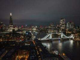 Aerial night view of the Tower Bridge in London. photo