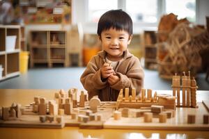 Cute little kid playing in montessori kids development center photo