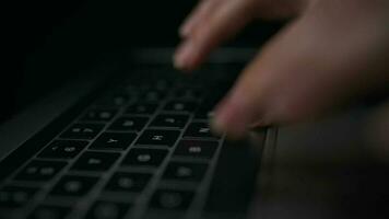 Macro close-up of female hands busy working on laptop or computer keyboard for send emails and surf on a web browser video