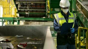 Waste Management Sorting Facility Caucasian Supervisor Preparing Documentation. video