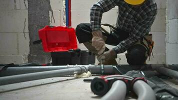 Professional Plumber Installing Pipeline Inside Newly Built House video