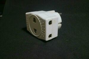 White electric socket with worn out condition photo