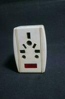 white electric socket with worn out condition photo