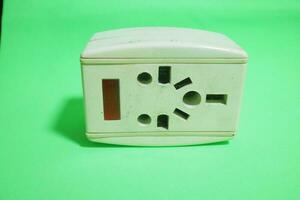 white electric socket with worn out condition photo