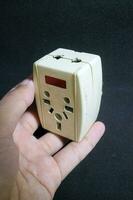 white electric socket with worn out condition photo