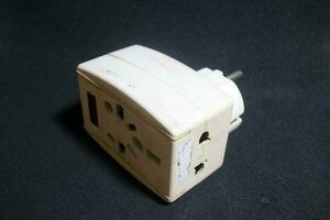 white electric socket with worn out condition photo