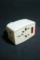 white electric socket with worn out condition photo