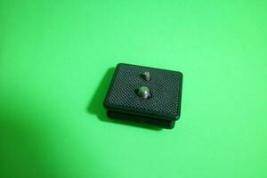 Square tripod mounting for camera in black color photo