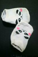 linda bebé calcetines con panda caras foto