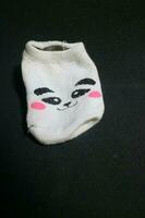 Cute baby socks with panda faces photo