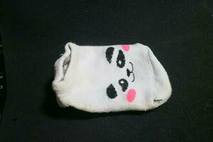 Cute baby socks with panda faces photo