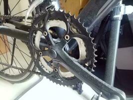 Photo of a bicycle crankset in black color