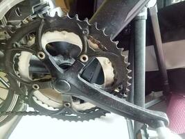 Photo of a bicycle crankset in black color