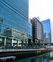 Low Angle Panoramic View of Canary Wharf Buildings at Central London City of England Great Britain. The Footage Was Captured on 08-June-2023 During Clear Day. photo