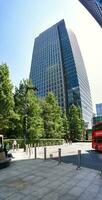 Low Angle Panoramic View of Canary Wharf Buildings at Central London City of England Great Britain. The Footage Was Captured on 08-June-2023 During Clear Day. photo