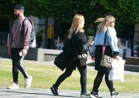 Beautiful Image of People at The Mall Shopping Centre Downtown of Central Luton City of England Great Britain for Shopping and Walking. The Image Was Captured on 02-June 2023 photo