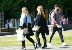 Beautiful Image of People at The Mall Shopping Centre Downtown of Central Luton City of England Great Britain for Shopping and Walking. The Image Was Captured on 02-June 2023 photo