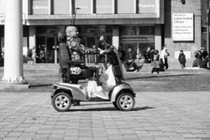 Beautiful Image of People at The Mall Shopping Centre Downtown of Central Luton City of England Great Britain for Shopping and Walking. The Image Was Captured on 02-June 2023 photo