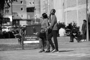 Beautiful Image of People at The Mall Shopping Centre Downtown of Central Luton City of England Great Britain for Shopping and Walking. The Image Was Captured on 02-June 2023 photo