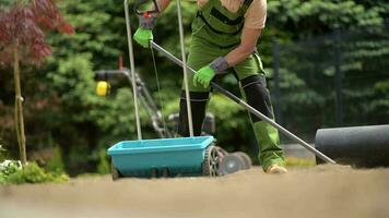 Raking Soil Before Grass Seeding video