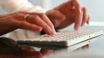 Caucasian Office Worker Typing Computer Keyboard Close Up Video