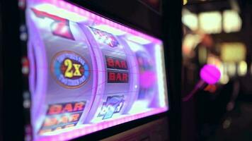 Las Vegas Slot Machine Player Inserting Banknote For Another Game video