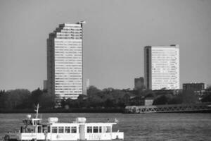 Low Angle view of Central London Buildings and River Thames at Canary Wharf Central London. The Footage Was Captured During Sunset over London City of England UK on June 08, 2023 photo