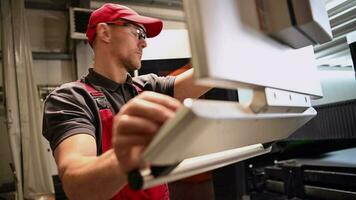 Metal Laser Cutter Operator Using Built In Touch Screen Display video