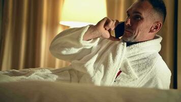 Man Making Phone Call Before Going to Sleep video