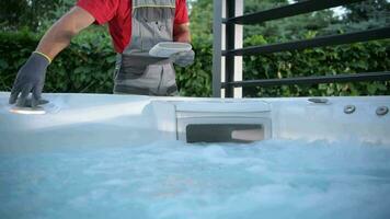 Garden SPA Technician Testing Hot Tub Remote video