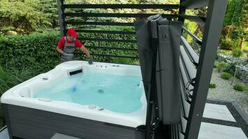 Caucasian Hot Tub Professional Technician Performing Machine Checks video