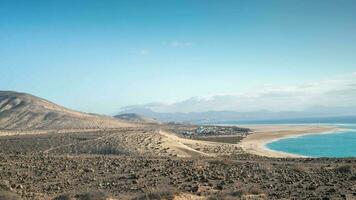 coastal desert landscape of Sotavento de Jadia in Fuerteventurawith sand dunes video