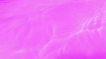 roxa água com ondulações em a superfície. desfocar borrado transparente Rosa colori Claro calma água superfície textura com salpicos e bolhas. água ondas com brilhando padronizar textura fundo. video
