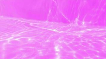 Purple water with ripples on the surface. Defocus blurred transparent pink colored clear calm water surface texture with splashes and bubbles. Water waves with shining pattern texture background. video