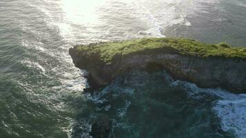 Aerial view of beautiful sunset at Beach in Indonesia with yellow sunny day. video