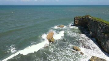 Aerial view of giant ocean waves crashing and foaming video