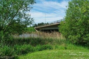 Most Beautiful Low Angle View of British City and Road of Milton Keynes City of England UK. The Footage Was Captured on 21-May-2023 During Warm Sunny Day of Summer. photo