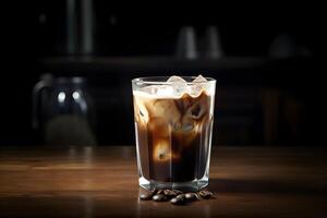 Iced Coffee and served over ice. It can be served black or with milk and sugar. . photo