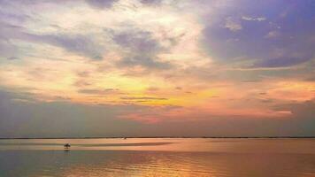 Sky sunset at beach scenery, Whether it's the warm hues of a sunrise or sunset, shimmering reflection of the sun on the clouds, the sky and clouds have the power to inspire feelings of awe and wonder video