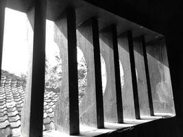 Photo of the air vents in my grandmother's house, black and white, similar to the ventilation in a prison