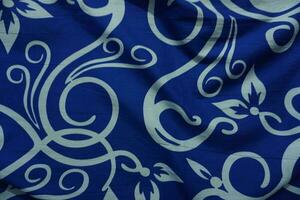 Bright blue background with batik ornaments such as flowers photo