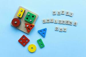 Flat lay children is day from wooden letters. Children is toys, children is puzzles photo