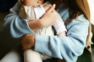 Mom with a baby. Active mom in restaurant with baby photo