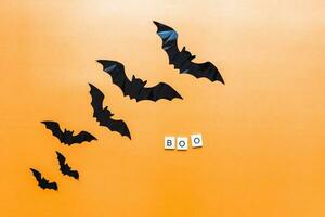 Flat lay halloween. Boo inscription. The bats photo