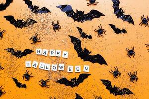 Lettering happy halloween. Flatly bats. Hslloween event, glitter photo