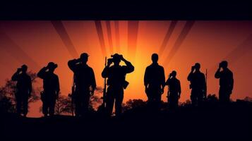 Silhouettes of soldiers in various poses or saluting against a sunset. photo