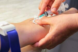 Doctor making vaccination ingection,. Medicine and healthcare concept. photo