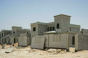 Construction site with cranes.Biton constructions photo