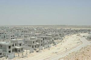 Construction site with cranes.Biton constructions photo